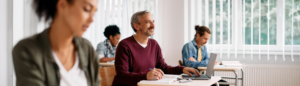 Header image of non-traditional students in a classroom setting